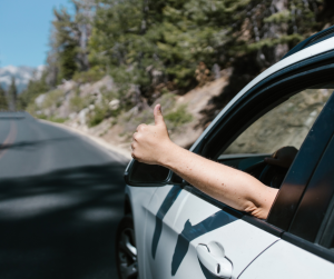 Person driving giving a thumbs up | Frederick, MD