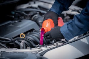 Pouring Coolant in Car | Frederick, MD